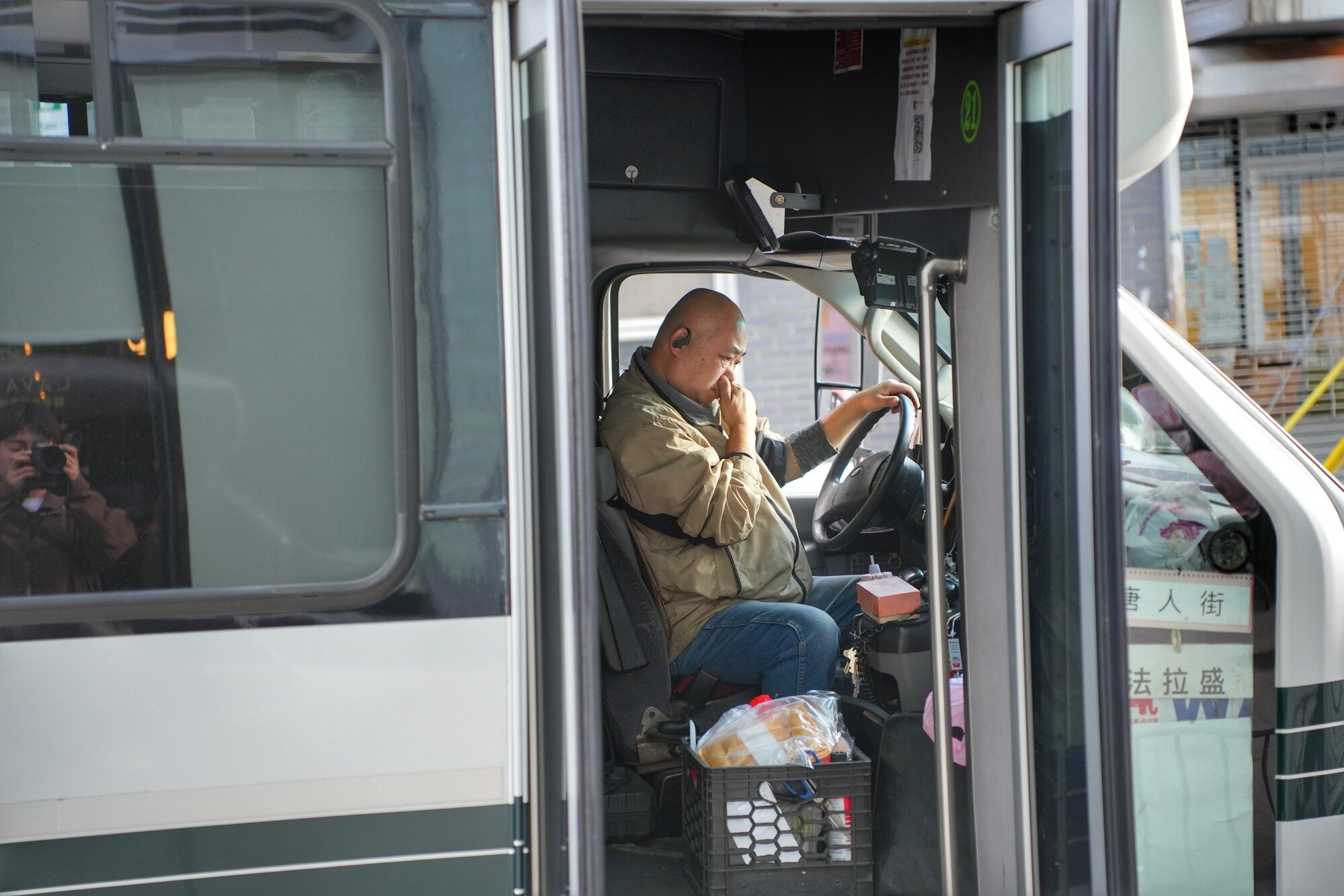 A driver prepares a shuttle connecting Chinatown and Flushing, two of New York’s largest Chinese communities. Nov. 8, 2025.